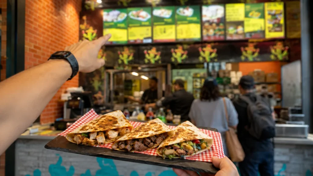 Chicken vs Beef vs Bean: How to Choose Your Quesadilla Filling at Pico De Gallo 1 Customer choosing between chicken, beef and bean quesadilla fillings at the counter
